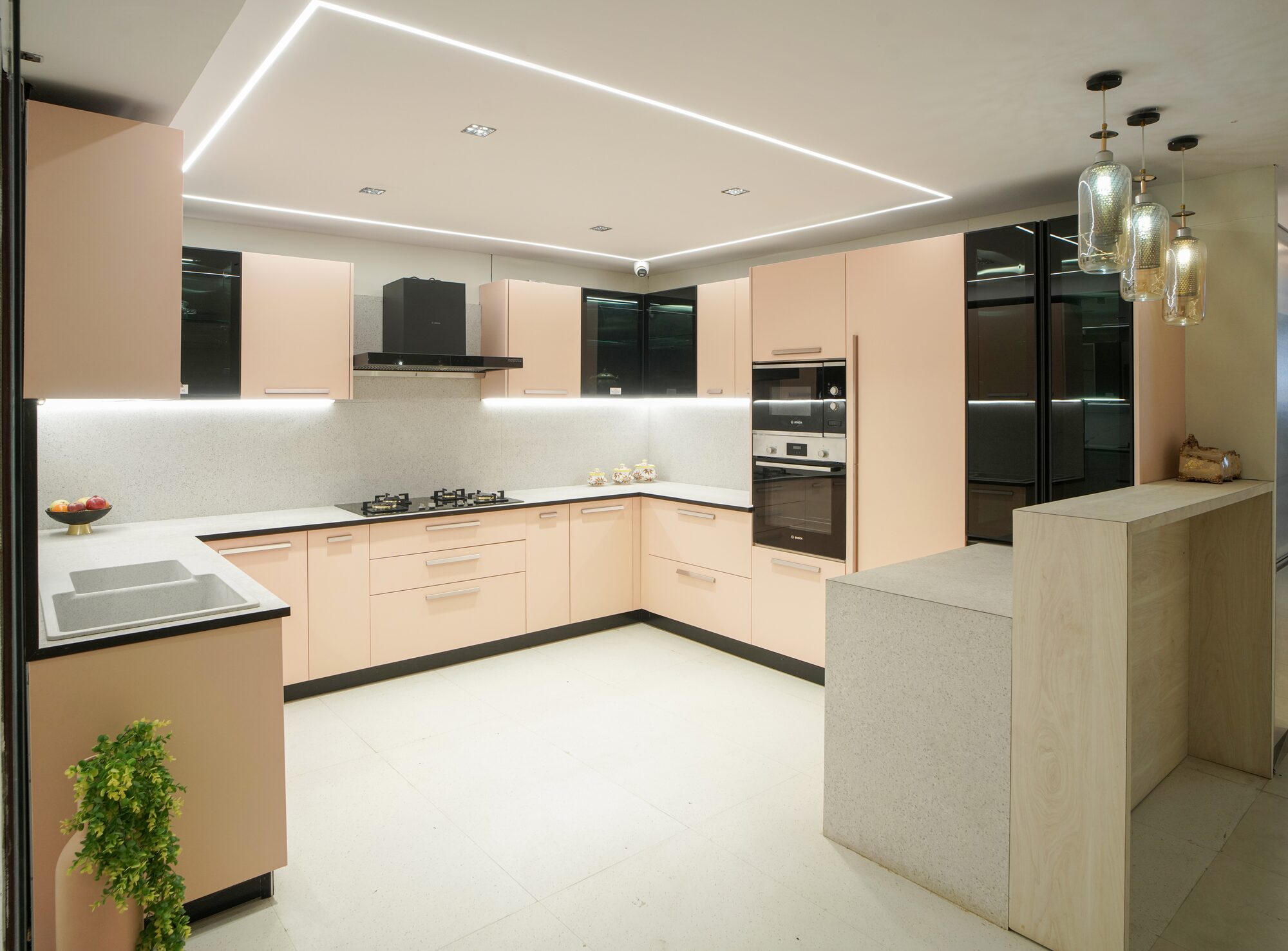 Blush pink gloss modular kitchen by Duchess Cocina