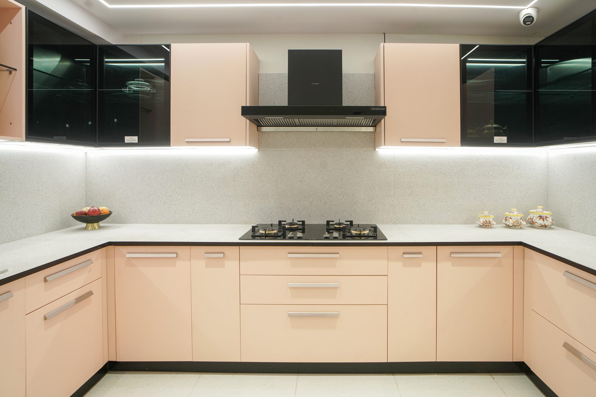 Blush pink gloss modular kitchen hob detail