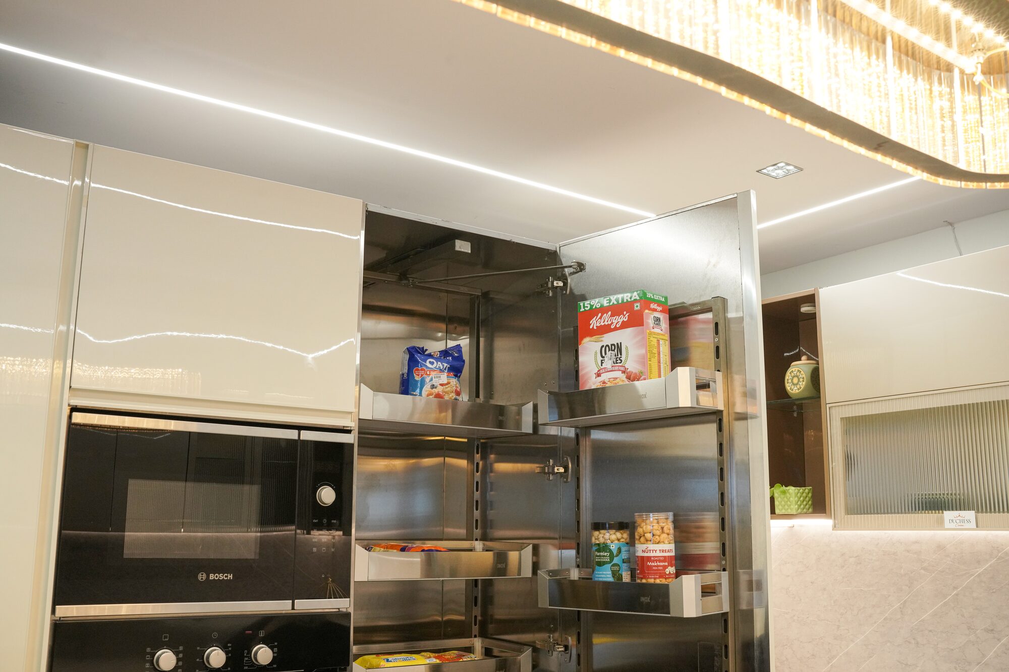 Champagne gloss modular kitchen cabinet detail